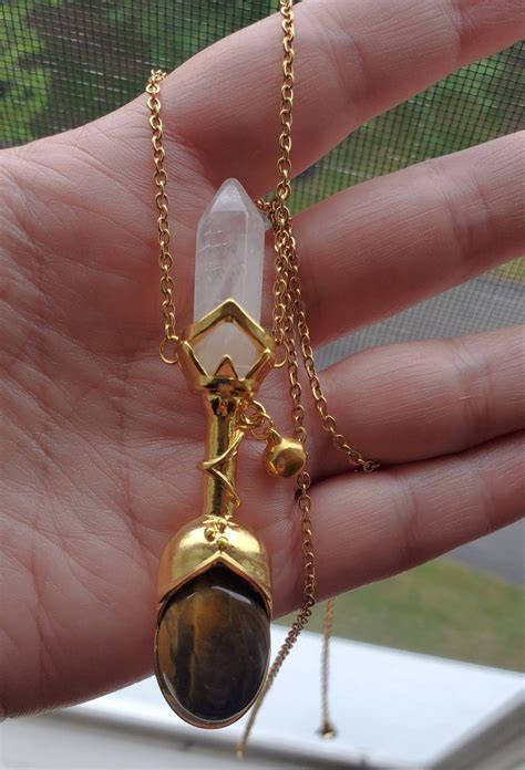 Practical magic necklace with tiger eye pendant